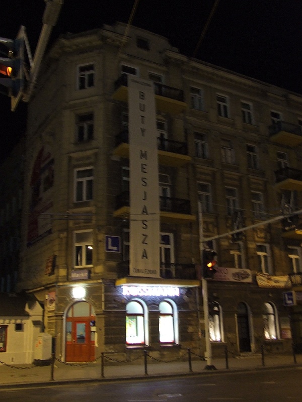 Buty Mesjasza - banner reklamujący książkę Pawła Laufra w ramach Festiwalu Miasto Poezji