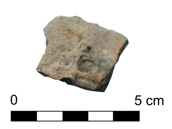 Znak garncarski w kształcie krzyża na dnie naczynia z przełomu X i XI wieku